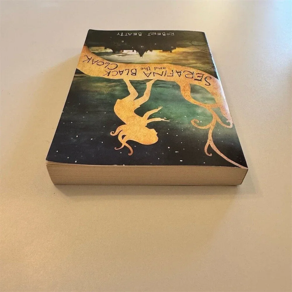 Serafina and the Black Cloak Paperback Book by Robert Beatty Scholastic